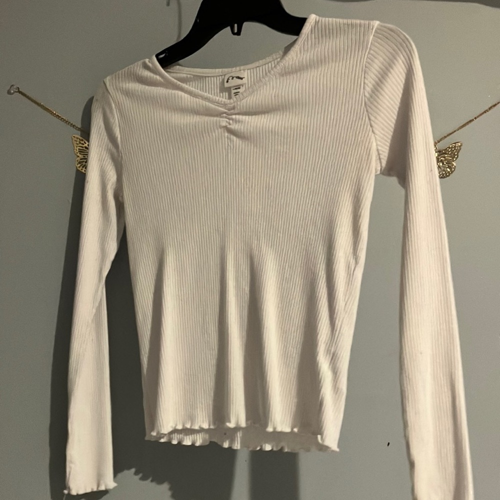 I am selling a white long sleeve shirt!